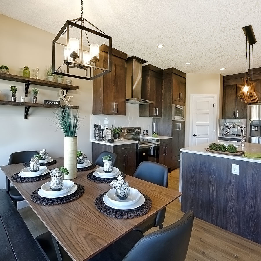 Image of dining and kitchen in the Areo Homes Mileena Duplex in West Haven Park